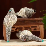 Tibetan hand-engraved Buddhist shankha conch shell decorations with silver inlay and turquoise beads