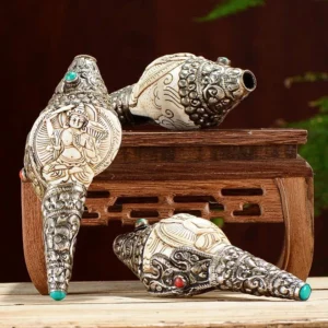 Tibetan hand-engraved Buddhist shankha conch shell decorations with silver inlay and turquoise beads