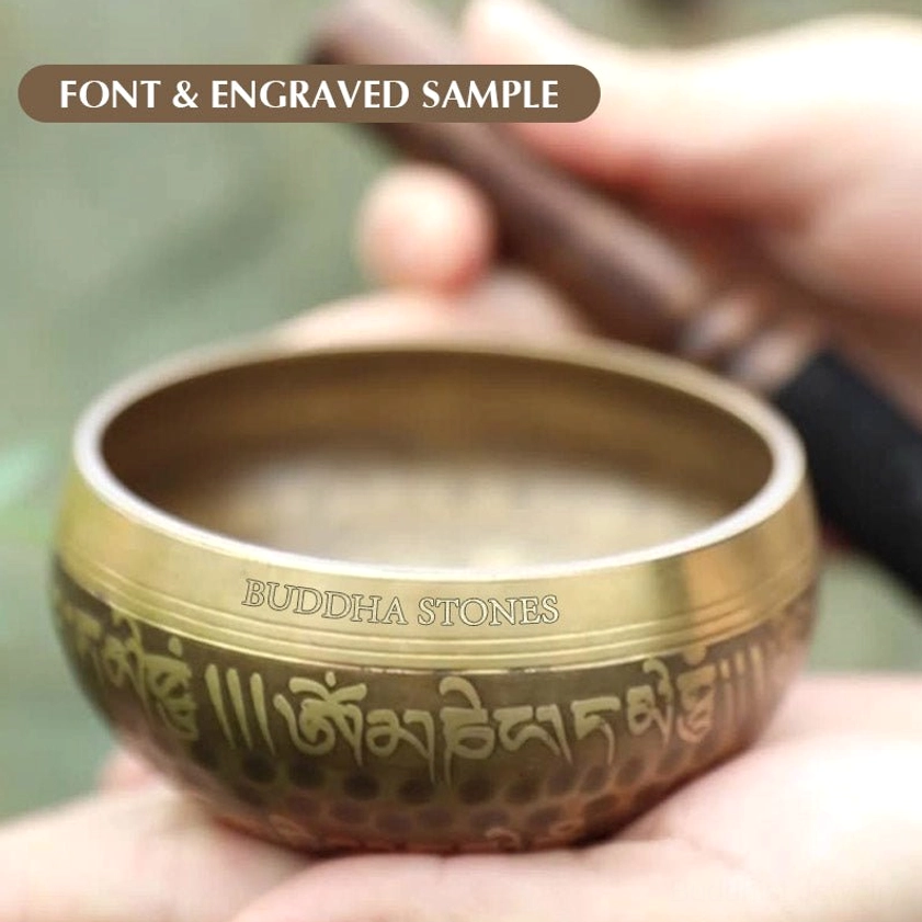Buddhist singing bowl artistic lifestyle photo showing meditation and mindfulness practice with authentic handmade bowl