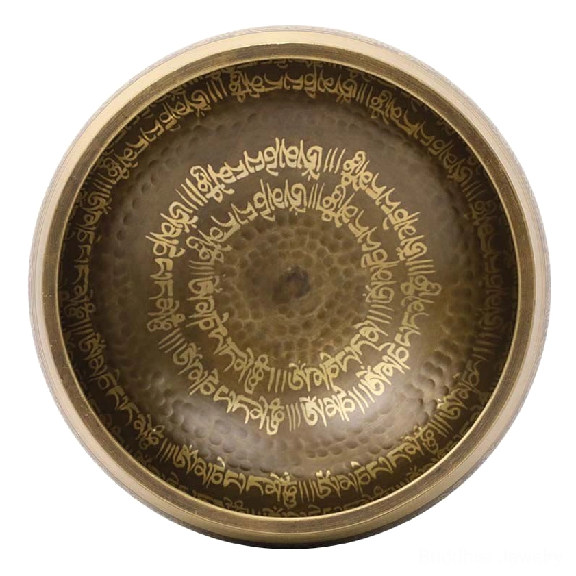 Authentic handcrafted Buddhist singing bowl with hammered surface and Sanskrit mantra engravings, traditional design for spiritual healing practices