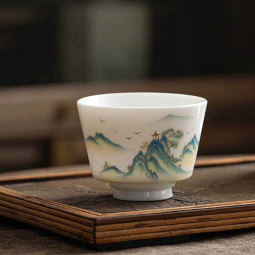 Premium handmade Buddhist ceramic tea cup with spiritual landscape design, perfect for tea ceremony and mindfulness practice