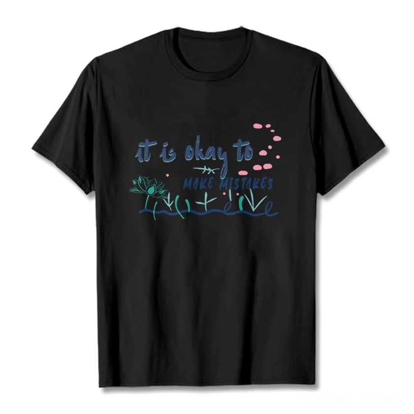 Black it's okay to make mistakes Buddhist graphic t-shirt flat lay with colored prints