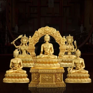 Collection of hand-cast copper Buddhist statues featuring Shakyamuni, Amitabha, and Medicine Buddha with gilded lotus pedestals