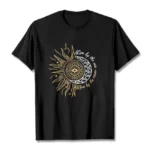 Live by the Sun Love by the Moon Buddhist T-Shirt flat lay front view with celestial sun and moon graphic print on black cotton
