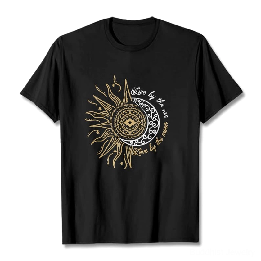 Live by the Sun Love by the Moon Buddhist T-Shirt flat lay front view with celestial sun and moon graphic print on black cotton