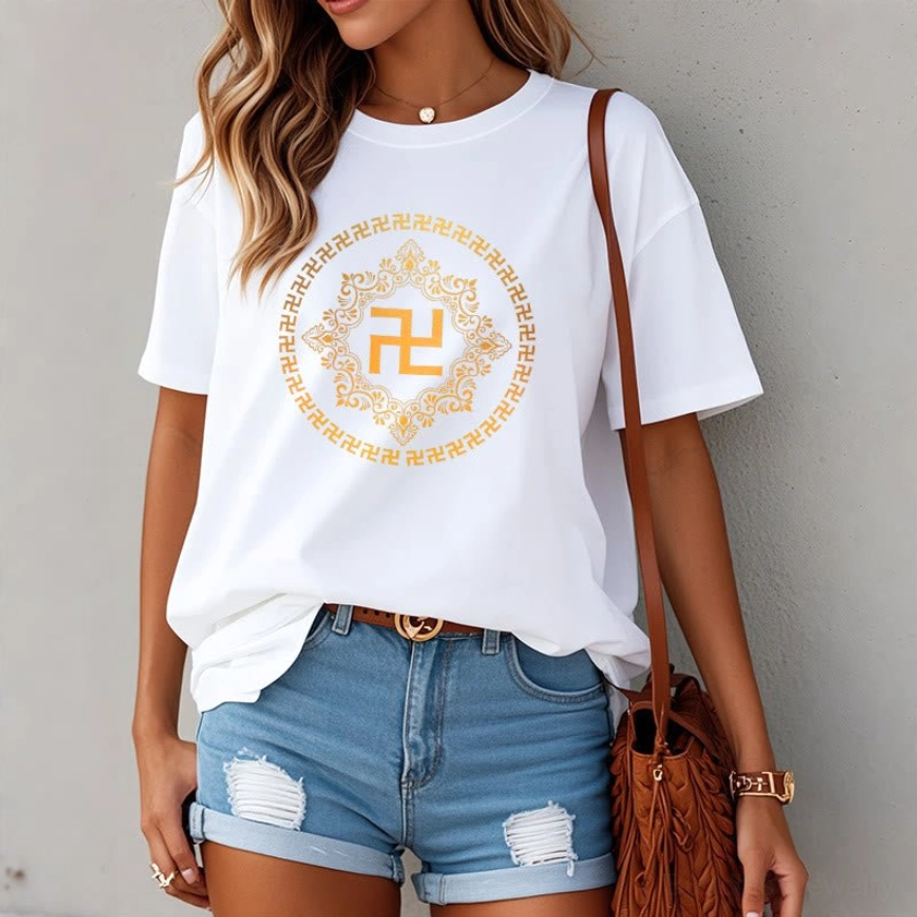 Woman wearing white Buddhist swastika spiritual t-shirt with golden mandala graphic