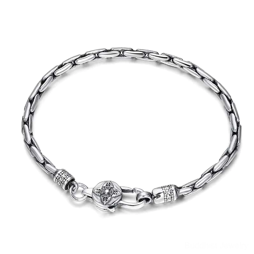 Handmade Buddhist silver bracelet featuring swastika auspicious symbol and vajra for good luck and inner peace