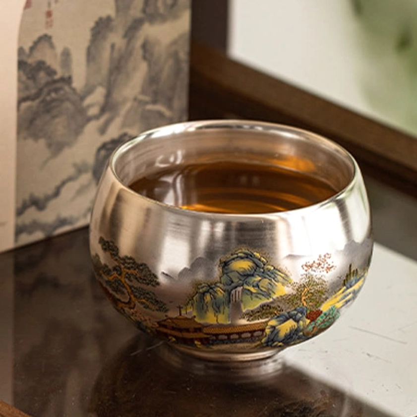 Buddhist tea cup with traditional aquatic motifs and artistic brushwork handcrafted ceramic detail