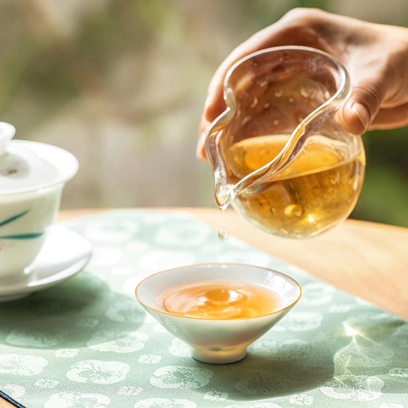 Buddhist symbolism teacup collection showing multiple authentic hand-painted designs 50ml cups