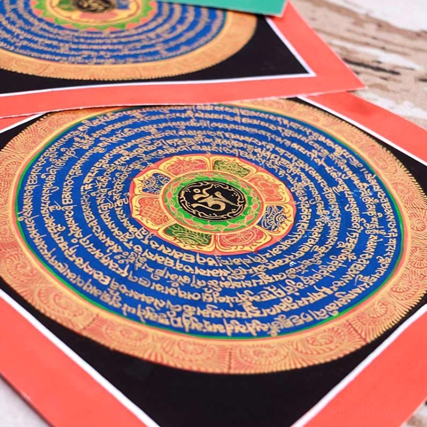 Handmade Buddhist thangka painting featuring sacred Om symbol for meditation and spiritual awakening practice