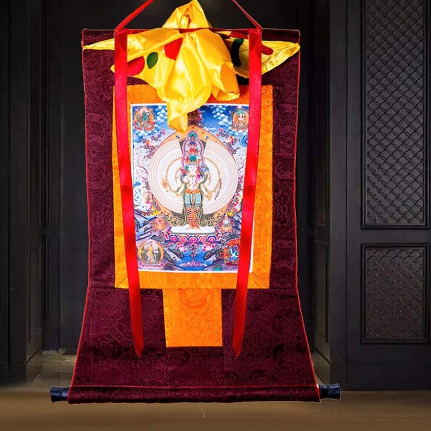 Hand-painted Buddhist thangka wall decoration with traditional hanging structure on dark wooden panels