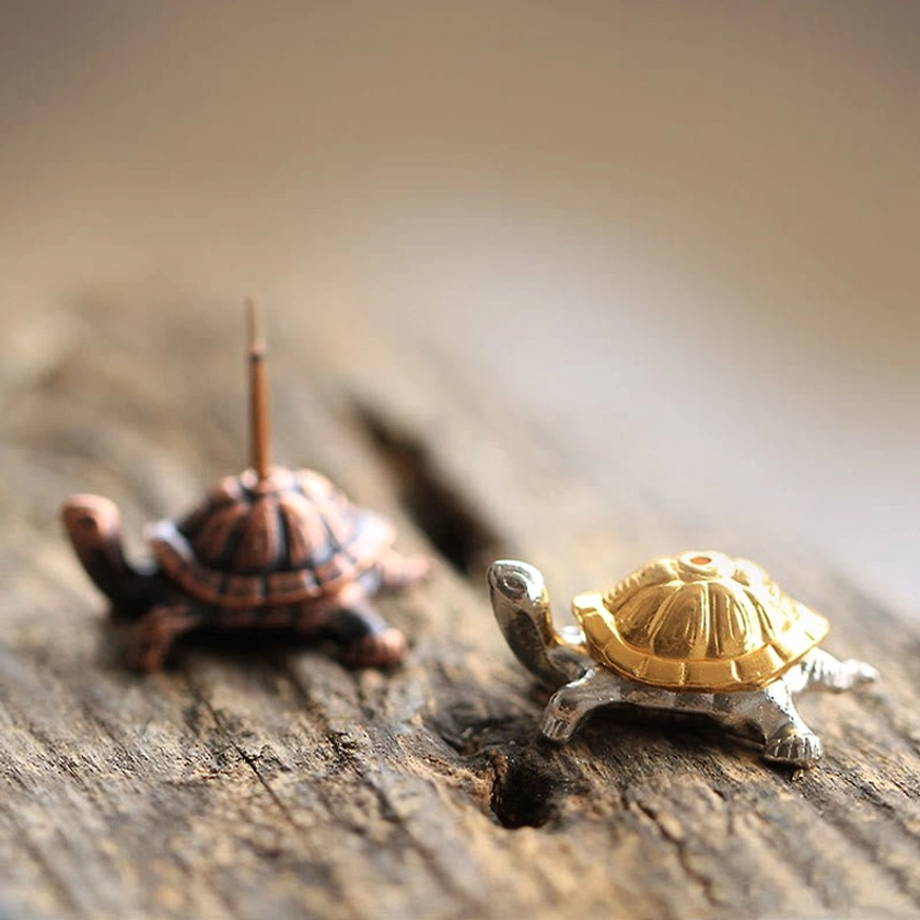 Buddhist incense holder set featuring both turtle and snail designs for meditation and spiritual practice