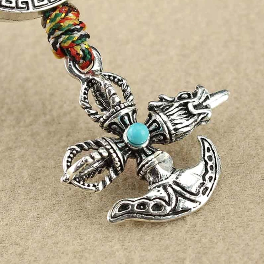 Buddhist vajra car ornament with five-pronged sacred symbol and gemstone inlay - spiritual protection charm for vehicles