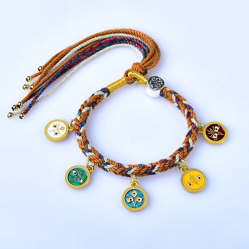 Five Gods of Wealth Buddhist brass string bracelet showing mixed-color braided rope with five metal enamel pendants and decorative tassel ends on white background