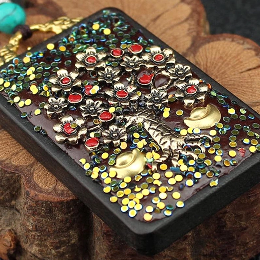 Buddhist wealth pendant necklace lifestyle image - spiritual jewelry for prosperity and protection