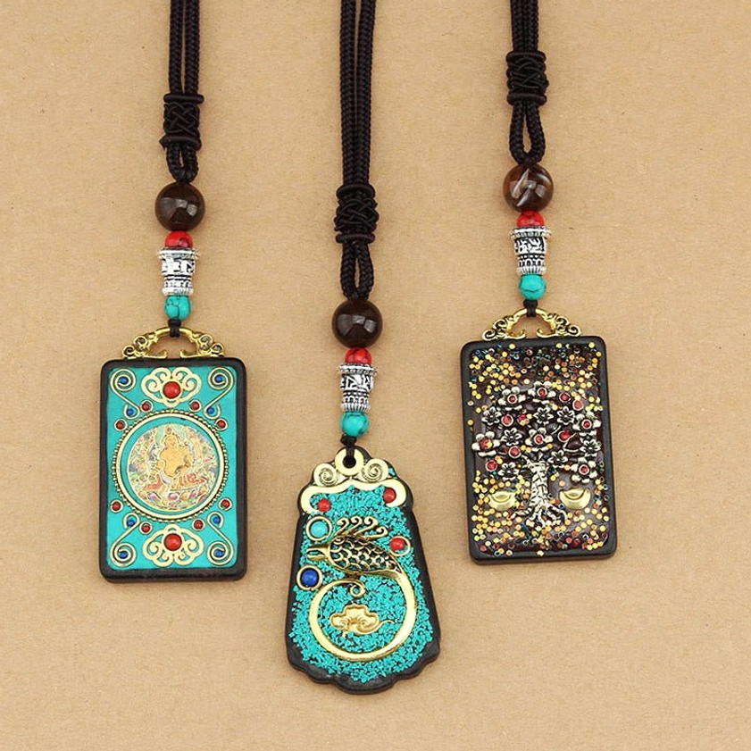 Buddhist wealth thangka necklace gift presentation - spiritual artifact with authentic heritage
