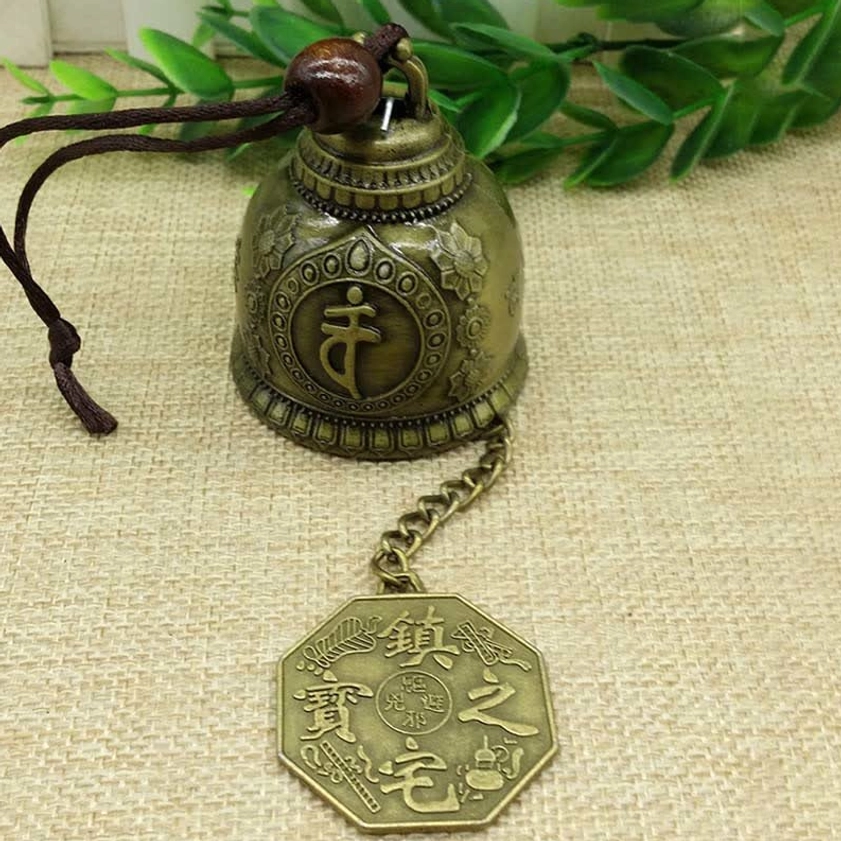 Complete Buddhist wind chime bell with hemp rope suspension and fish metal pendant charm