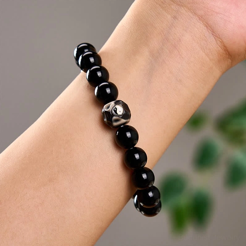 Buddhist Yin Yang harmony bracelet with premium black onyx beads perfect for meditation and spiritual practice
