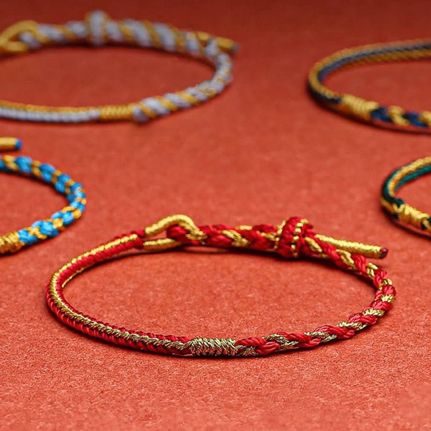 Assorted zodiac Buddhist bracelets set featuring multiple colors and twisted braided designs