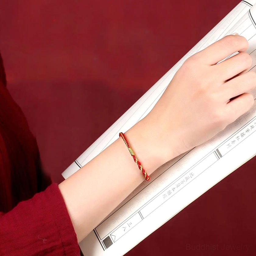 Handmade Buddhist zodiac protection bracelet showcasing traditional braided cord craftsmanship