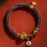 Handwoven Buddhist zodiac natal buddha red string bracelet with sterling silver charm and om mani padme hum pendant
