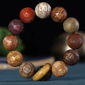 Buddhist zodiac carved wooden bracelet with 12 zodiac animal symbols in rosewood, green sandalwood, and ebony wood beads, featuring Chinese character engravings and wooden lucky buckle