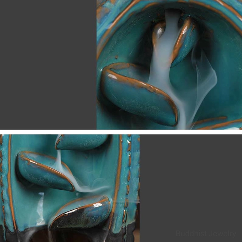 Front close-up of backflow incense channel showing leaf-shaped smoke path and flowing incense cascade