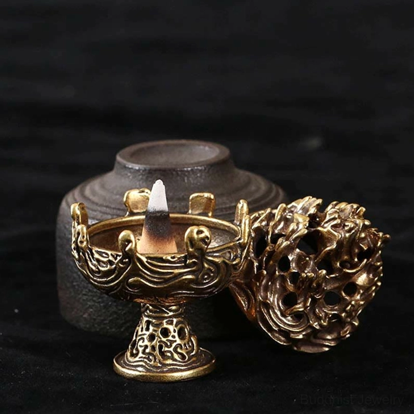 Handcrafted Buddhist incense burner showing intricate carved mountain patterns and vintage patina, suitable for spiritual practice and home decor