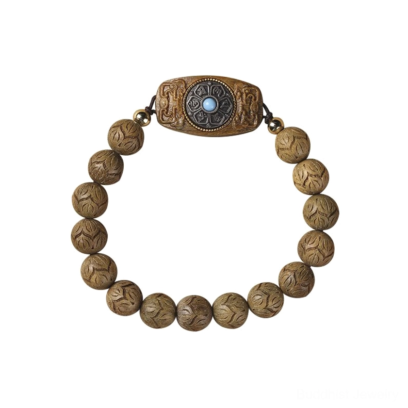 Carved sandalwood mala bracelet with symmetrical beaded layout and detailed central piece