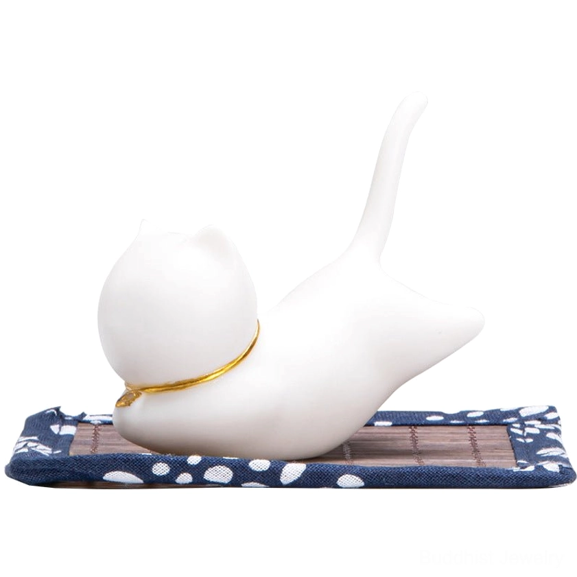 Cat ceramic incense burner back oblique view on pure white background with long rectangular floral edge bamboo mat, full product display