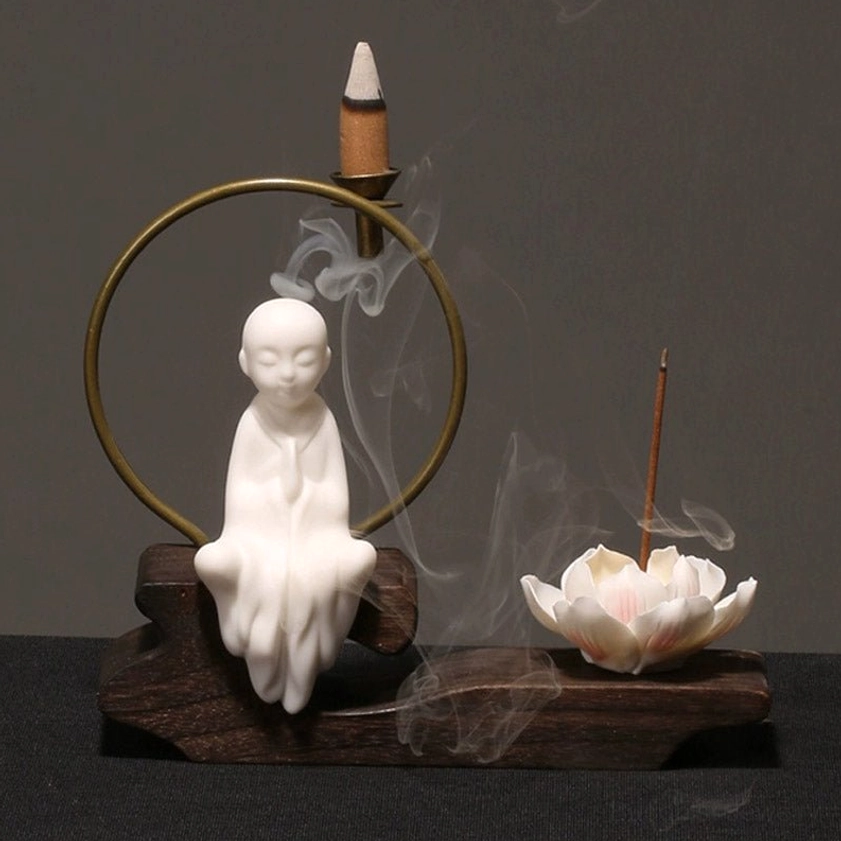 Handcrafted ceramic backflow incense burner with Buddhist figurine, aromatic meditation tool for home altar and wellness space