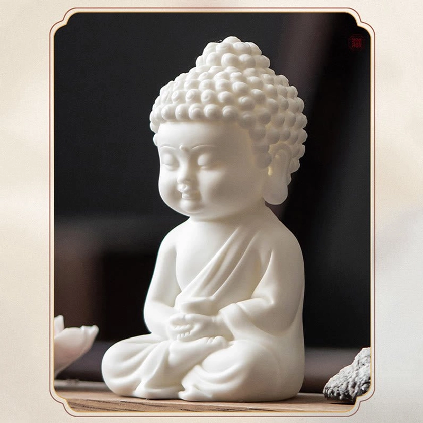 Close-up of handcrafted white ceramic Buddha in lotus meditation pose for incense burner set