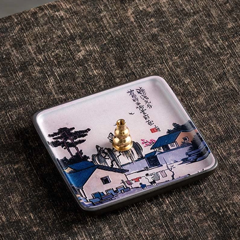 Ceramic incense burner tray with house and tree design for creating tranquil wellness spaces at home