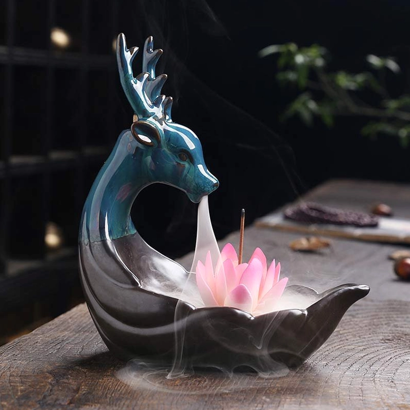 Pink Lotus Ceramic Deer Backflow Incense Burner - Left Three-Quarter View with Flowing Smoke Effect