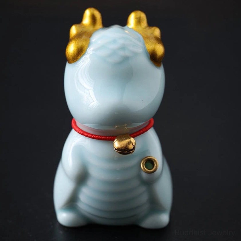 Celadon dragon ceramic incense burner direct rear view with smooth blue glaze and golden dragon details
