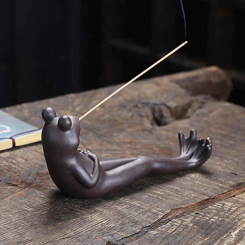 Buddhist ceramic frog incense burner back view showing stretched legs detail, natural earth tone