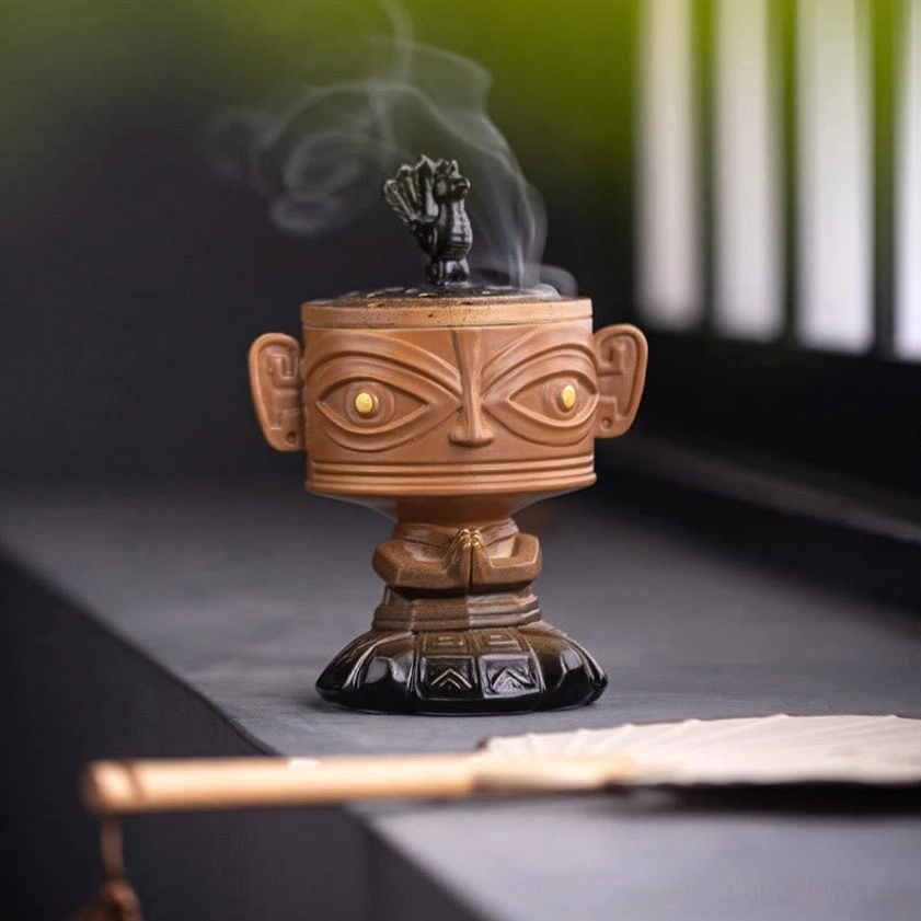 Handcrafted ceramic incense burner in neutral studio lighting, showing complete artisan detail and finish
