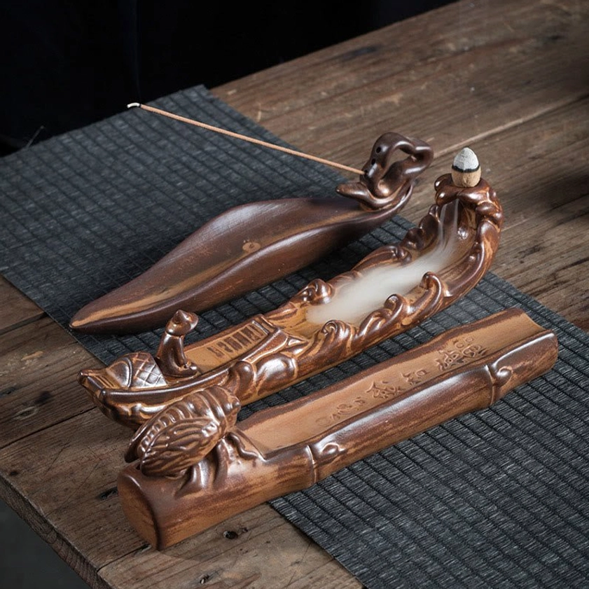 Product packaging and presentation of ceramic boat and cicada incense burner collection with natural materials