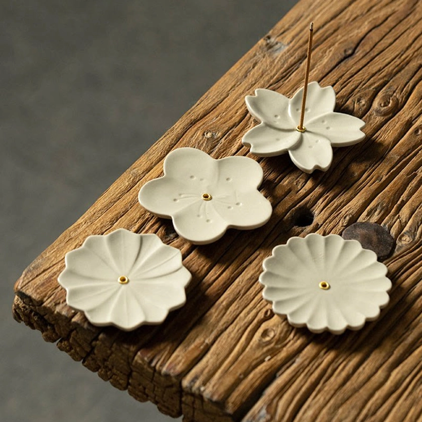 Ceramic incense burner close-up detail showing petal texture and craftsmanship quality