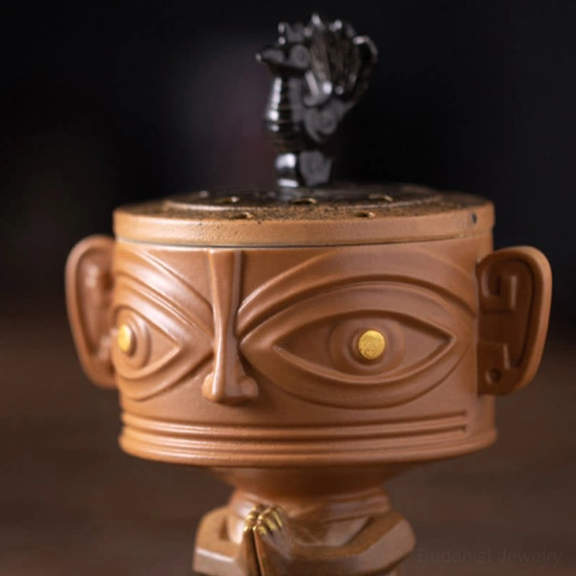 Ceramic incense burner in home décor setting, meditation room ambiance with natural lighting
