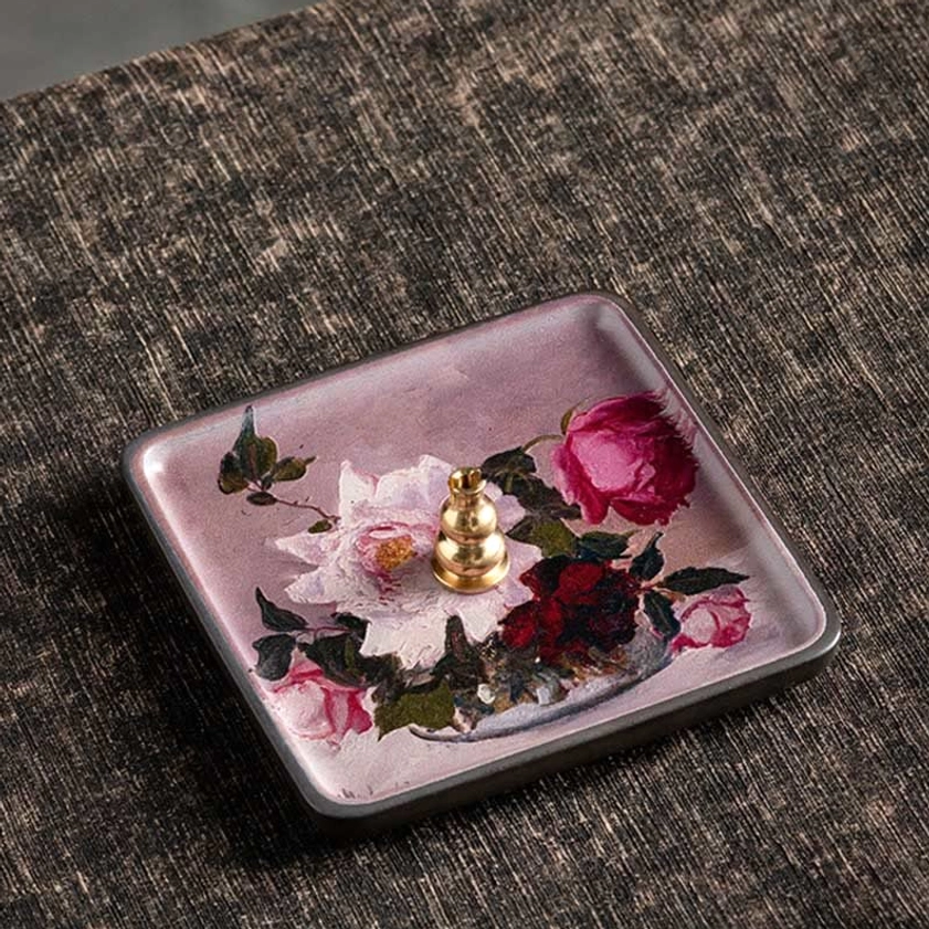 Rose design ceramic incense burner symbolizing compassion and beauty in Buddhist spiritual practice