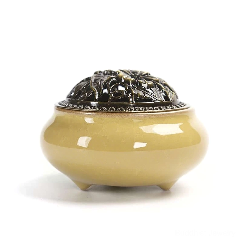 Yellow ceramic incense burner with crackle glaze finish and decorative bronze metal lid