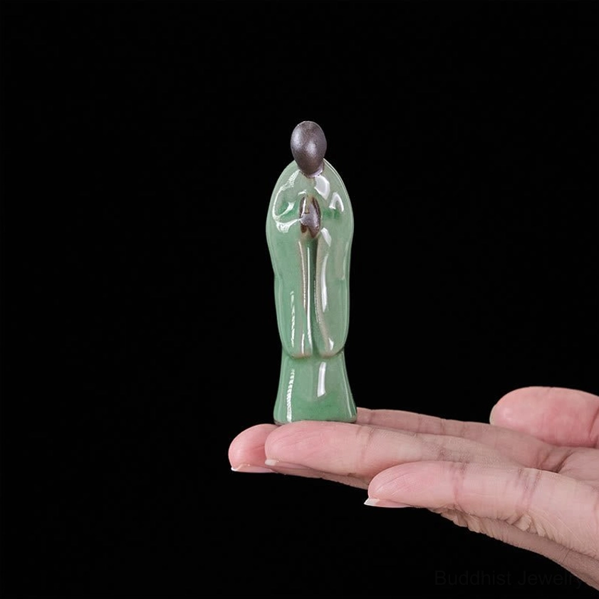 Handcrafted ceramic meditation monk statue detail authentic glaze finish