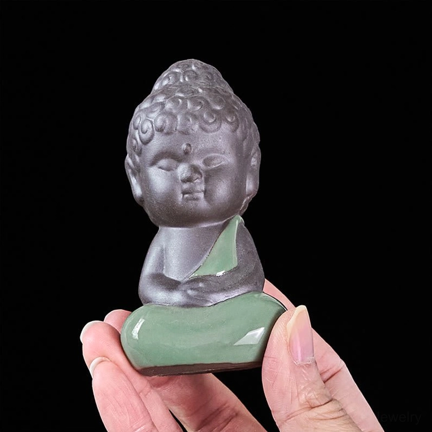Ceramic meditation monk statue with flowing robe spiritual aesthetic design