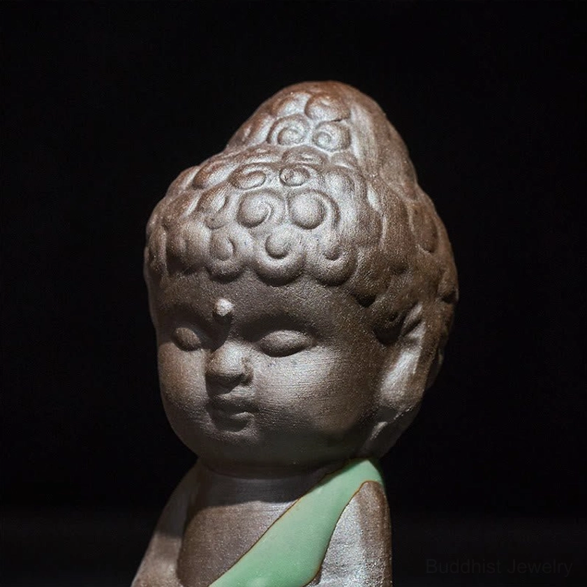 Handcrafted ceramic monk statue with intricate details and peaceful presence