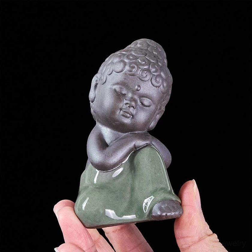 Ceramic meditation monk statue in natural earthy tones matte glazed finish