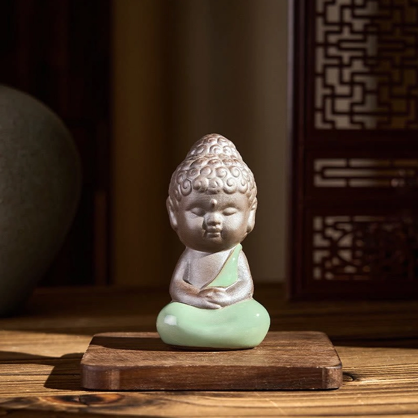 Small ceramic meditation monk statue perfect for personal shrine or workspace