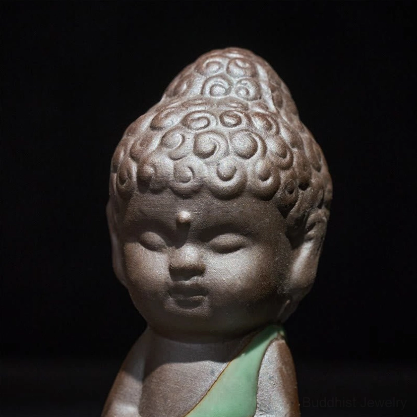 Ceramic meditation monk statue three-quarter angle showing depth and dimension