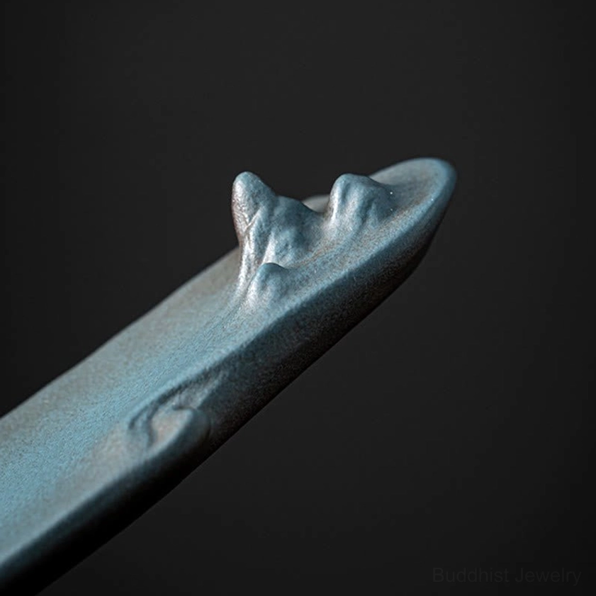 Detailed view of ceramic mountain incense burner showing artistic mountain carving and surface finish quality of handcrafted design