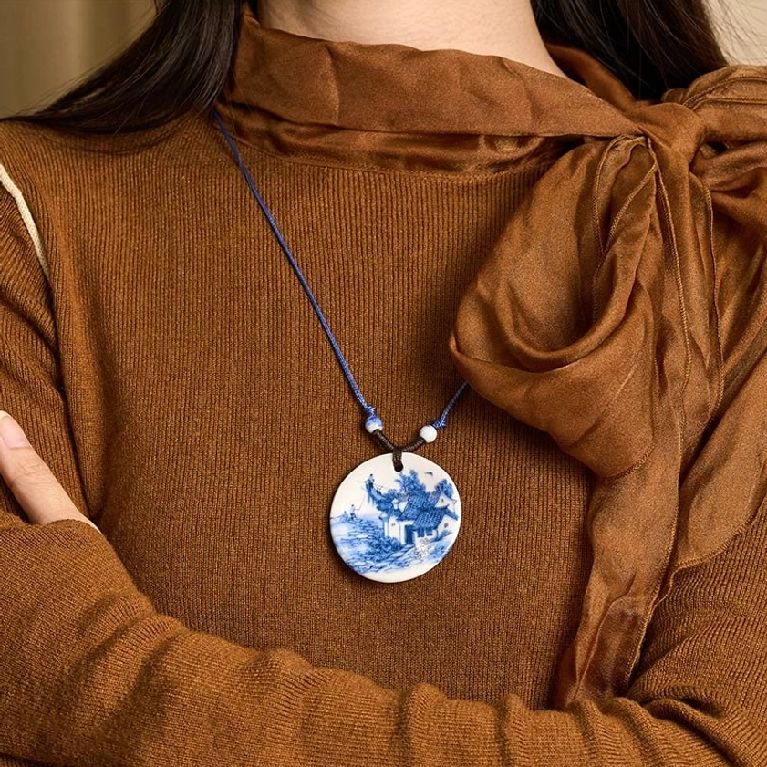 Ceramic pendant necklace detail view showing quality of natural woven rope and ceramic bead placement